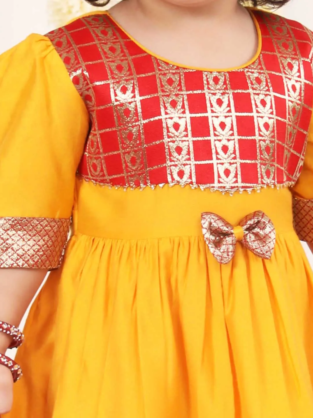 Jashvi Girl's Red And Yellow Banarsi Frock